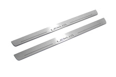 Two long silver-finished door sill plates with Lexus lettering on a light background, angled view.