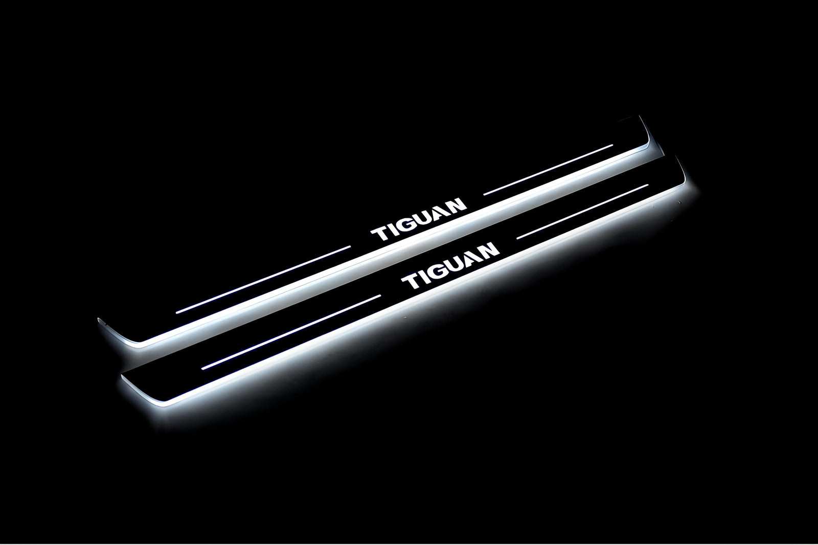 LED door sill plates Volkswagen Tiguan II 2016+ in stainless steel with Tiguan logo