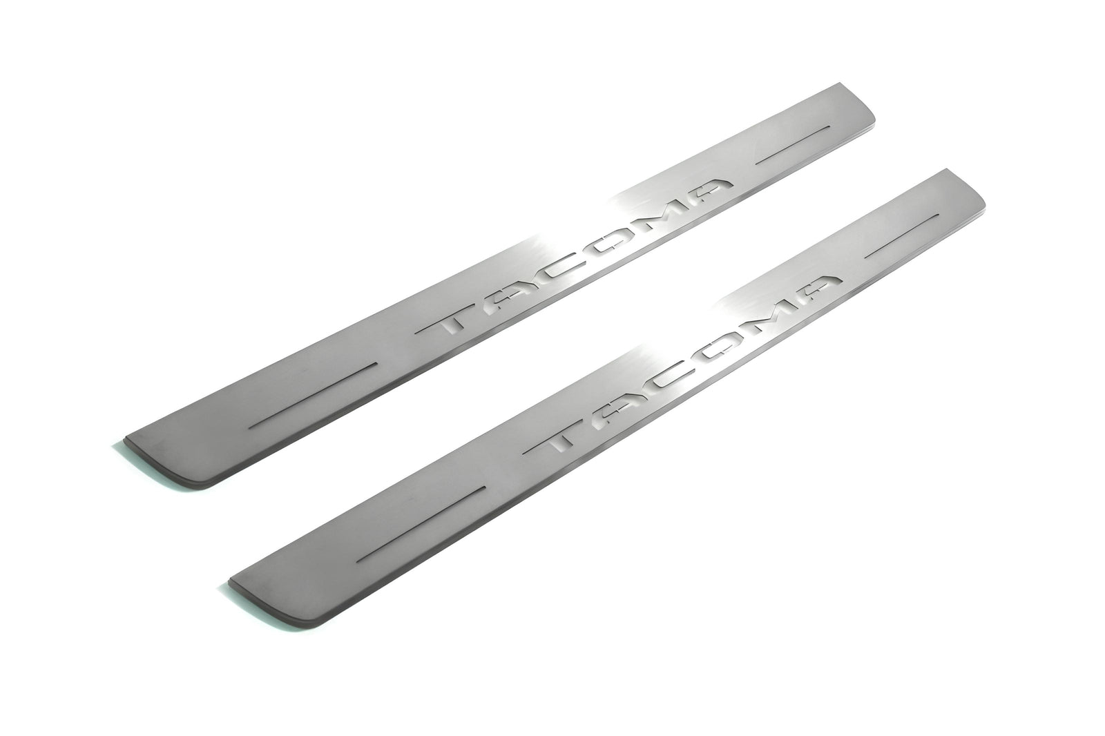 Toyota Tacoma III 2016+ illuminated entry guards in stainless steel with Tacoma logo