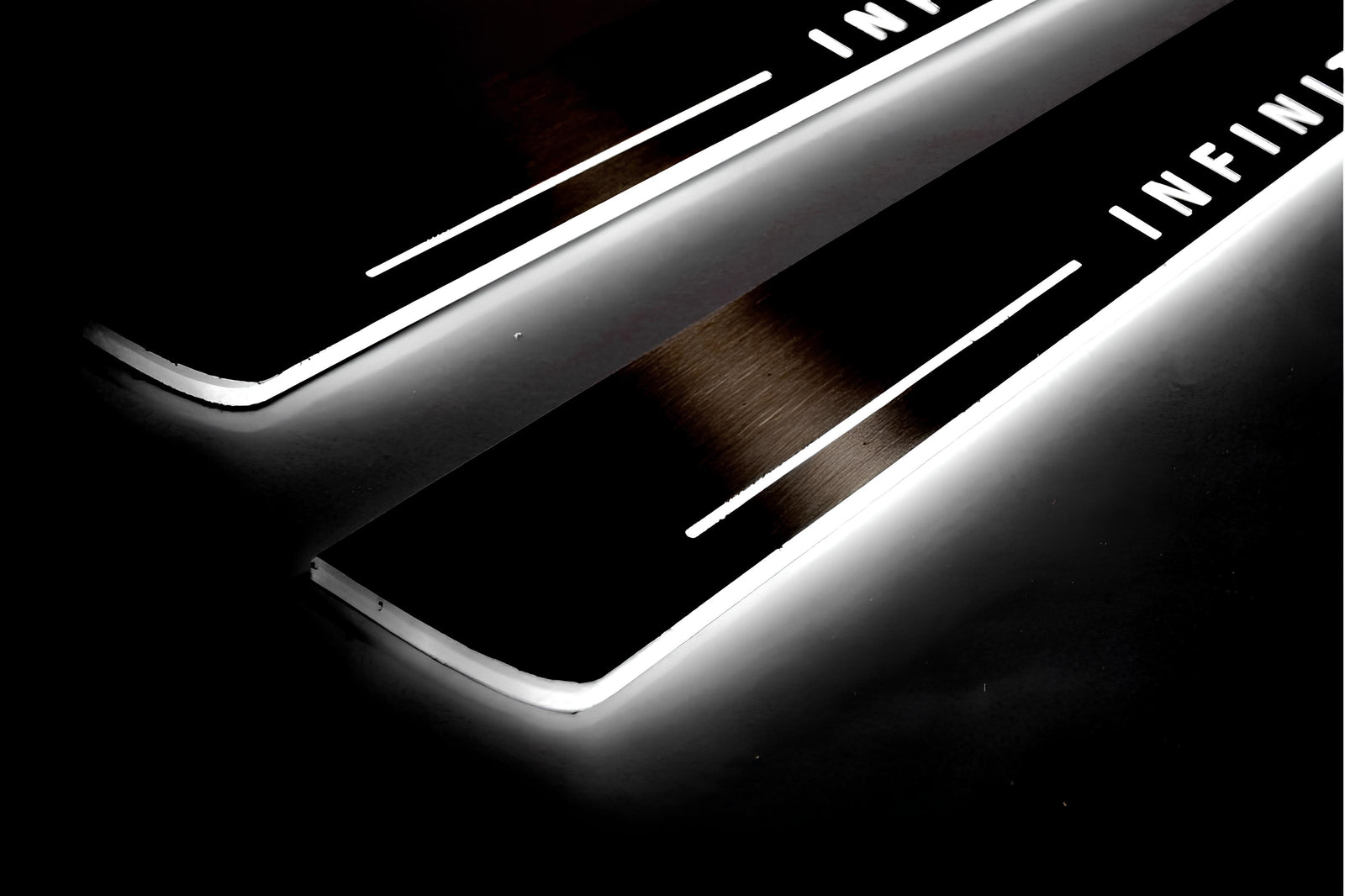Infiniti G coupe 2008+ illuminated entry guards in stainless steel with Infiniti logo
