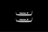 Mazda 3 II 2009+ entry guards in stainless steel with Mazda 3 logo