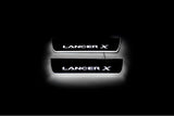 Mitsubishi Lancer X 2007+ LED door sill plates in stainless steel with Lancer X logo
