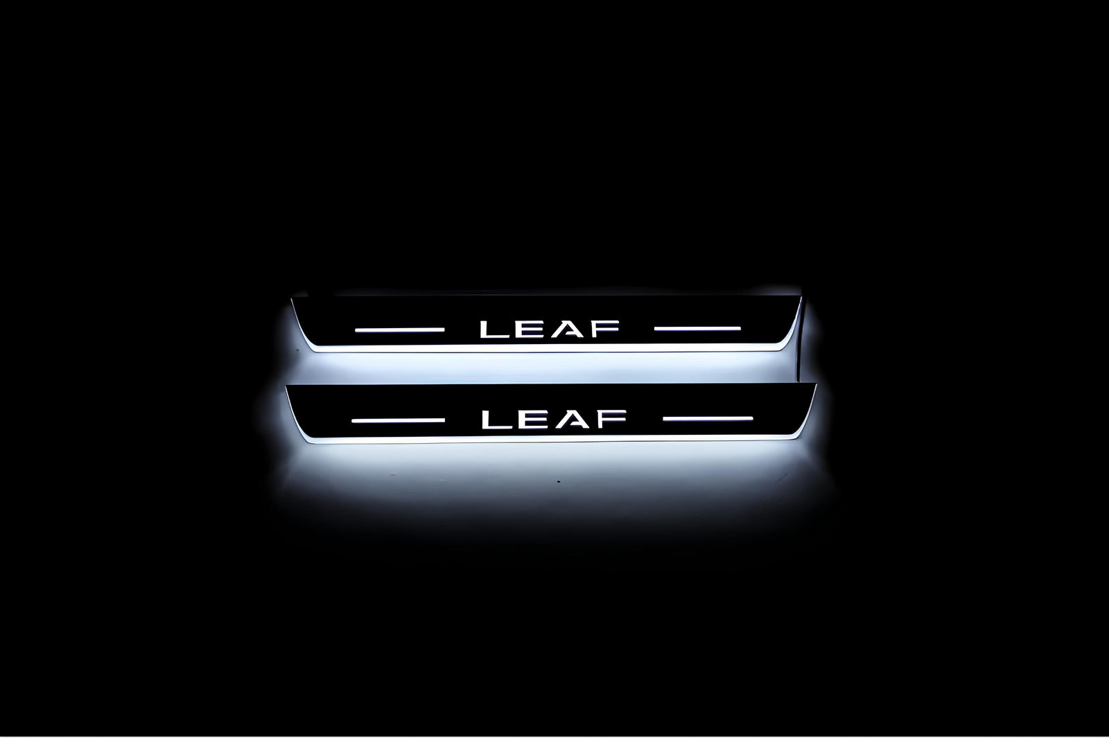 Nissan Leaf I 2010+ stainless steel LED door sill plates with Leaf logo