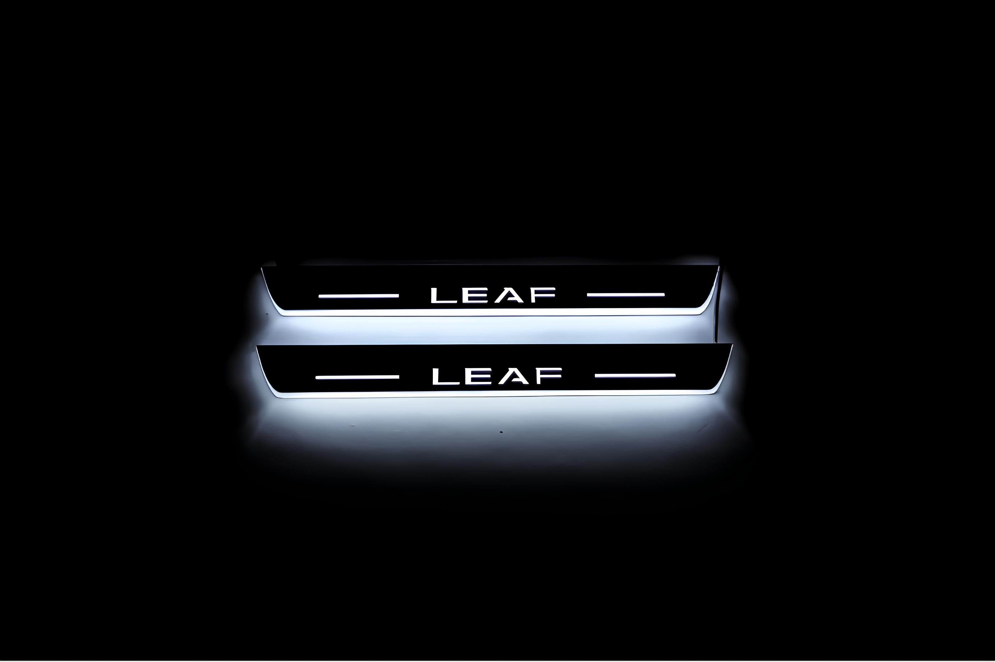 Illuminated LED Door Sill Tread Plates Nissan Leaf II 2017+ With Leaf Logo Nissan Led Door Sills opdesign