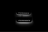 Ford Fusion II CD4 2012+ stainless steel LED door sill plates with Fusion logo