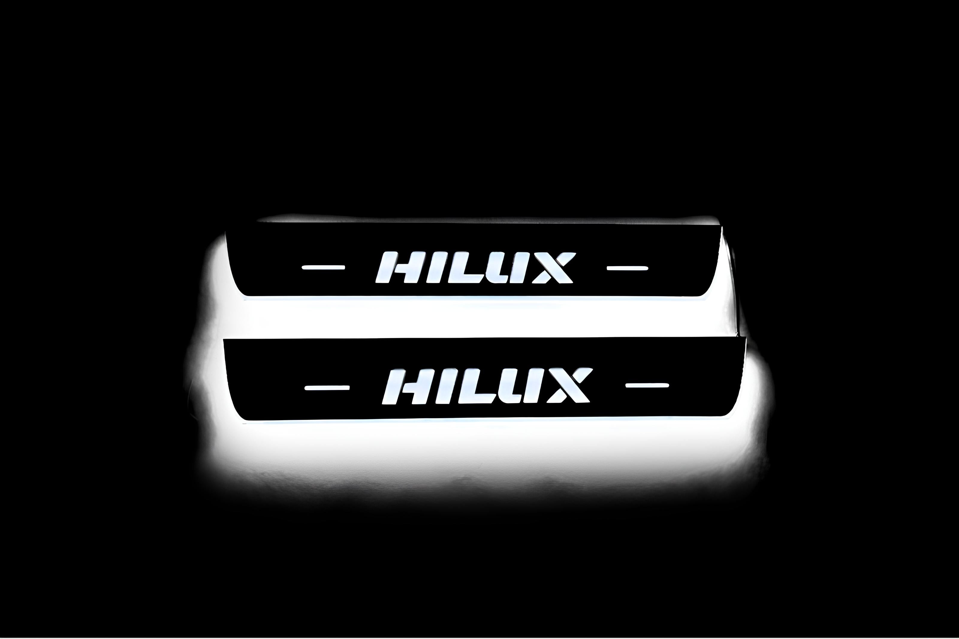 Illuminated LED Door Sill Tread Plates Toyota Hilux VIII 2015+ With Hilux Logo Toyota Led Door Sills opdesign