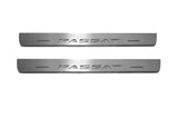 Two short silver-finished door sill plates with Passat lettering on a light background, straight-on view.