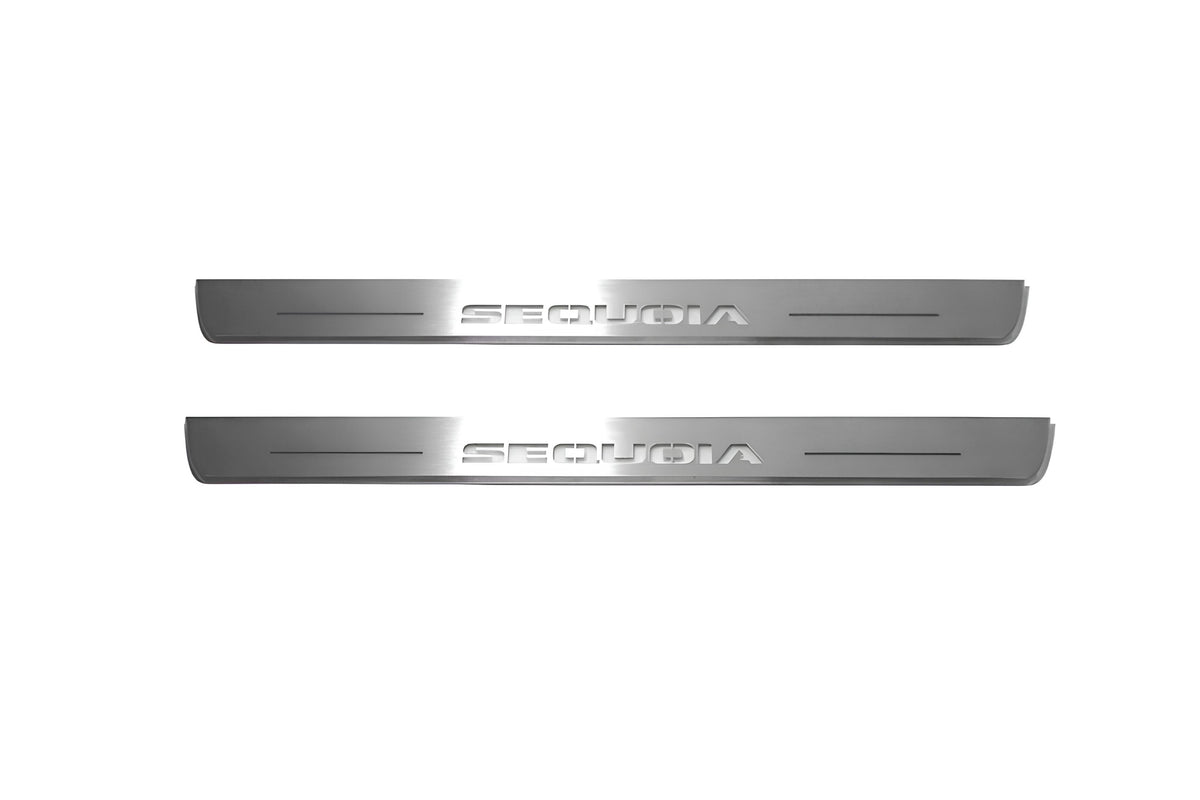 Two short silver-finished door sill plates with Sequoia lettering on a light background, straight-on view.