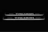 Toyota Tacoma N400 2024–Present — Stainless Steel LED Door Sills — Tacoma Logo