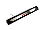 Black molded threshold trim with a silver insert bearing red X5 lettering and an attached wire, angled view on a white background.