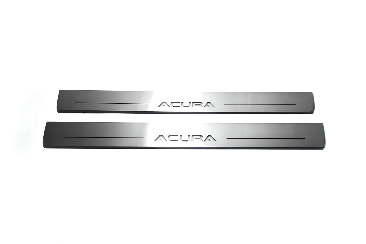 Two long silver-finished door sill plates with Acura lettering on a light background, straight-on view.