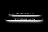 Toyota Tacoma III 2016+ LED door sill plates stainless steel with Tacoma logo