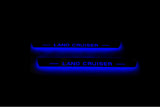 Toyota LC 200 2007+ stainless steel LED door sill plates with Land Cruiser logo