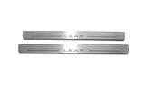 Nissan Leaf I 2010+ illuminated entry guards in stainless steel with Leaf logo