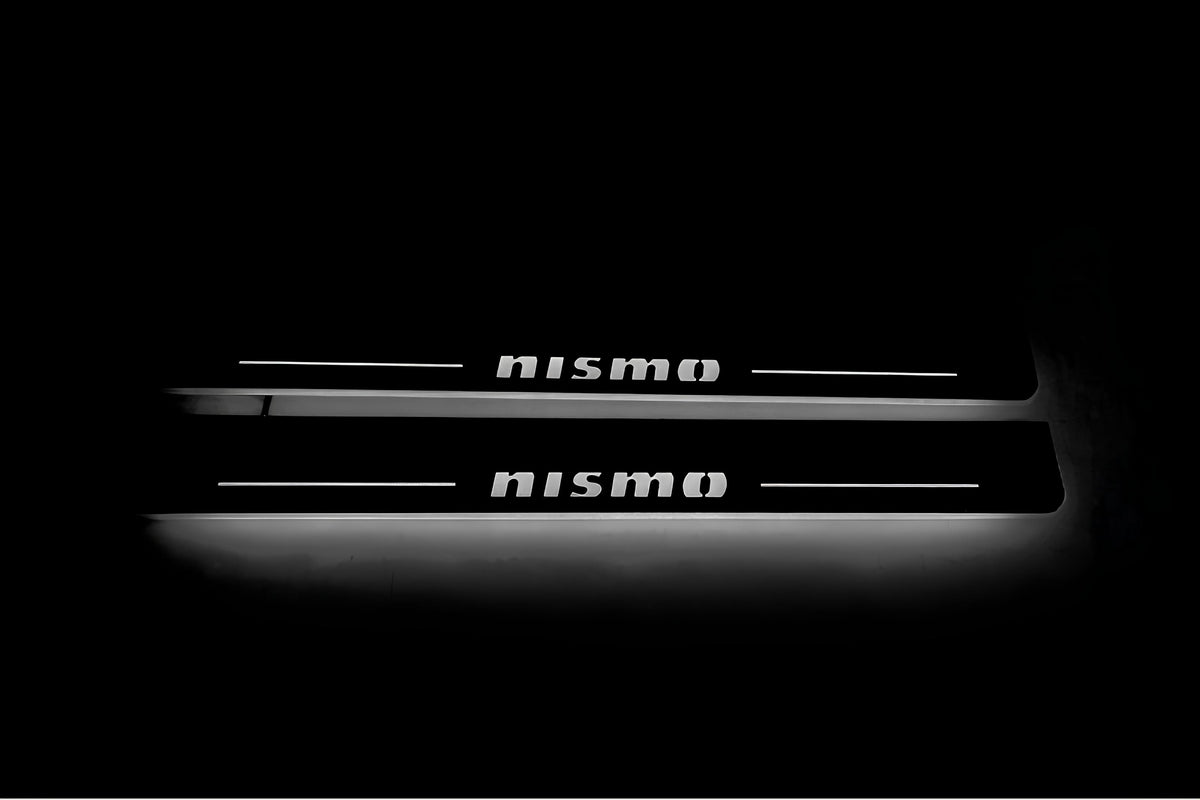 Nissan Patrol Y62 2010+ illuminated entry guards in stainless steel with NISMO logo