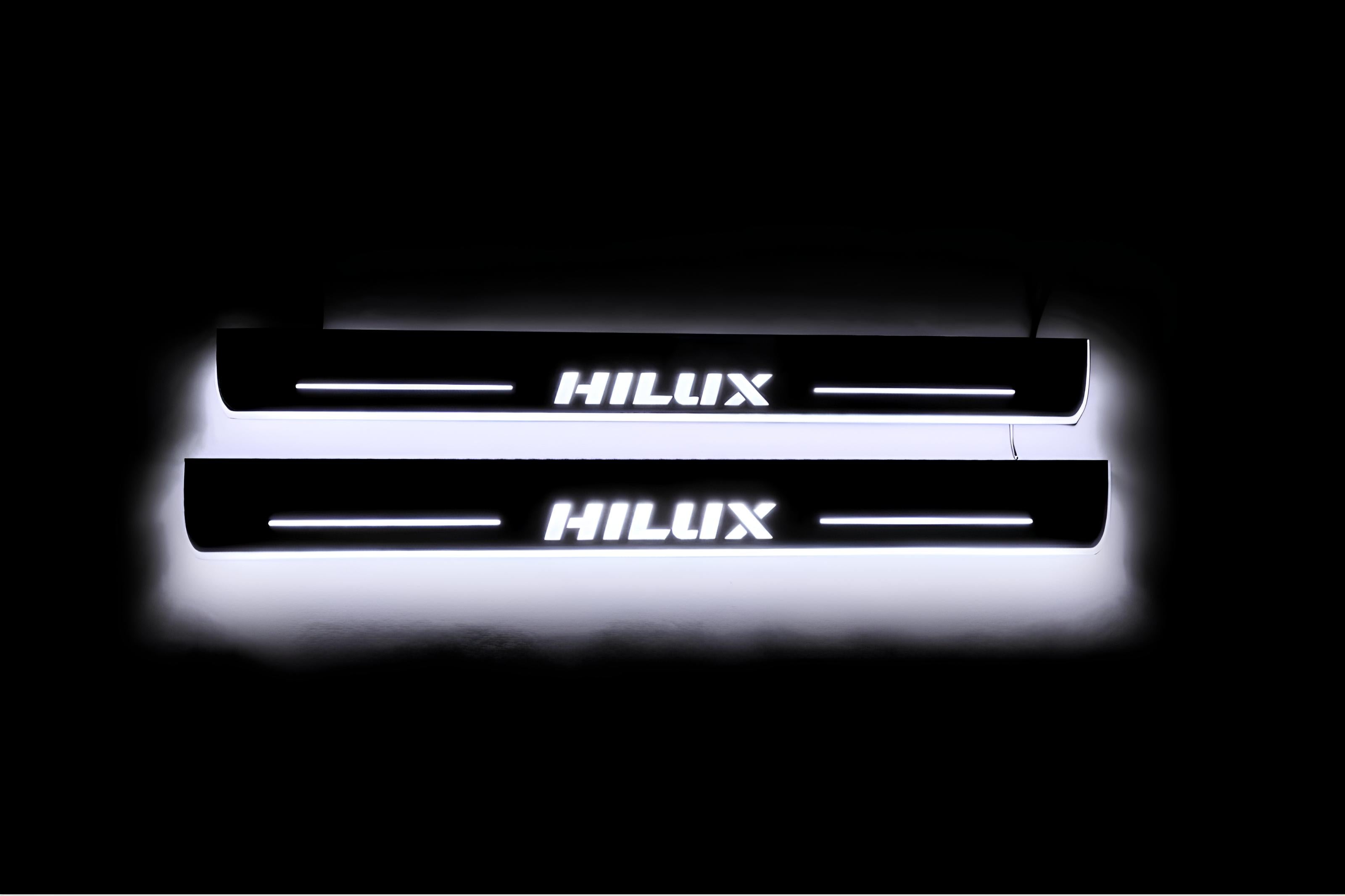Illuminated LED Door Sill Tread Plates Toyota Hilux VIII 2015+ With Hilux Logo Toyota Led Door Sills opdesign