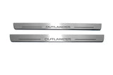 Mitsubishi Outlander II CW 2007+ illuminated entry guards in stainless steel with Outlander logo