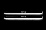Subaru BRZ 2011+ illuminated entry guards in stainless steel with BRZ logo