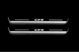 Mazda II 2016+ door sill plates in stainless steel with CX-9 logo