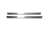 Chrysler 200 II 2015+ illuminated entry guards in stainless steel with Chrysler logo