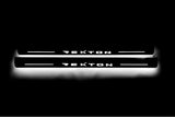 SsangYong Rexton II 2006+ entry guards in stainless steel with Rexton logo