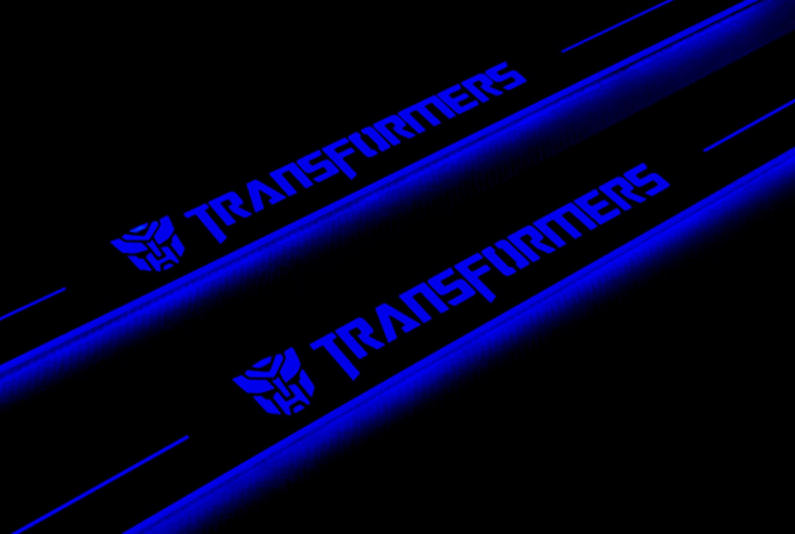 Chevrolet Camaro V E37 2009+ stainless steel LED door sill plates with Transformers logo