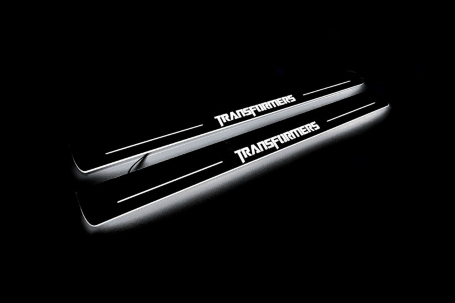 Chevrolet Camaro V E37 2009+ stainless steel LED door sill plates with Transformers logo
