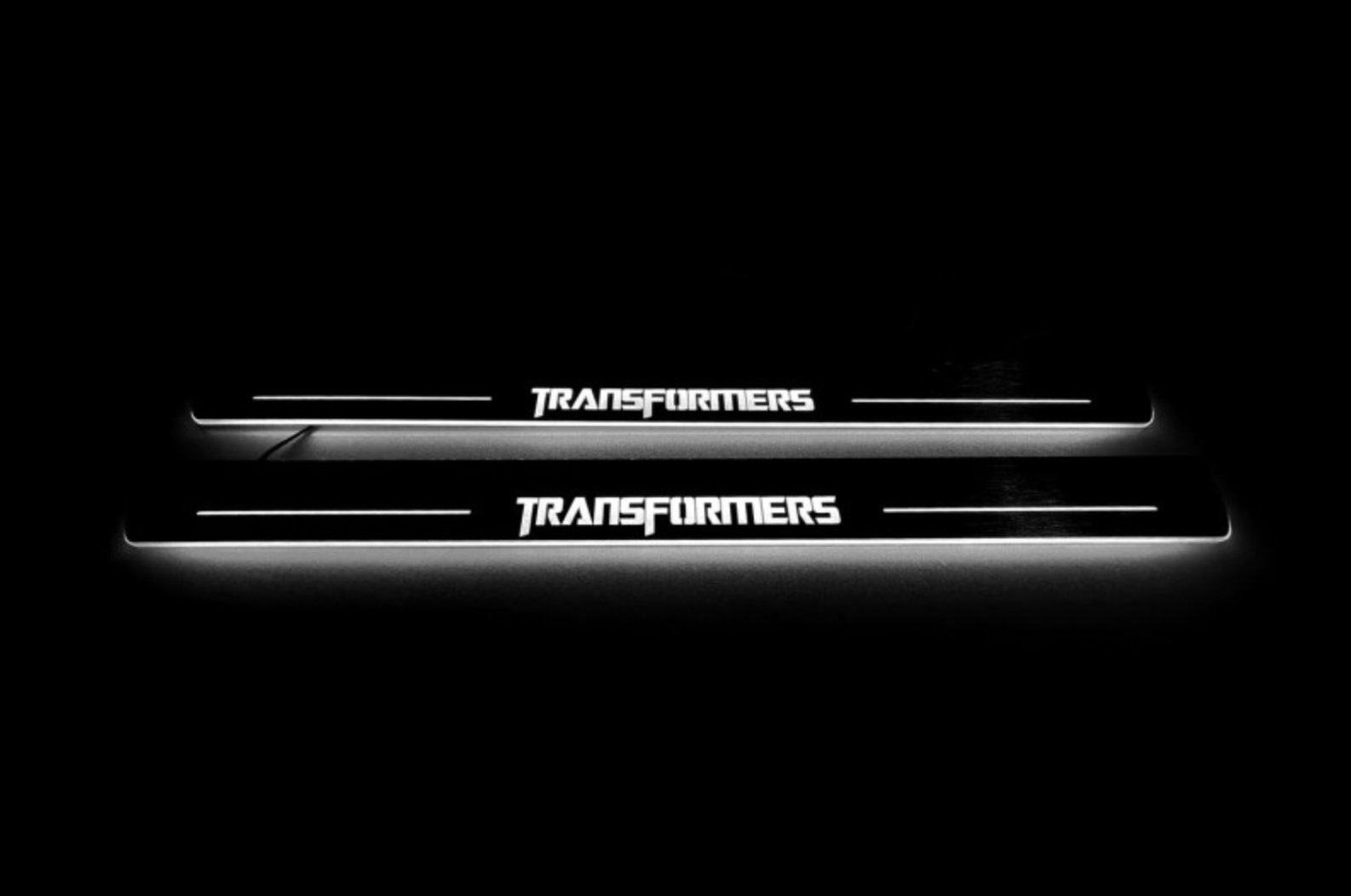 Chevrolet Camaro V E37 2009+ stainless steel LED door sill plates with Transformers logo