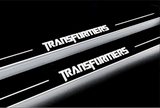 Chevrolet Camaro V E37 2009+ stainless steel LED door sill plates with Transformers logo