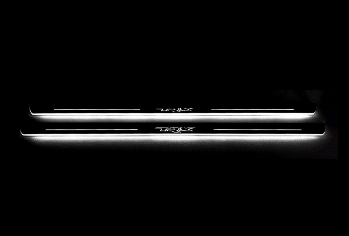 RAM 1500 V 2019+ stainless steel illuminated door sill protectors with Illuminated TRX logo