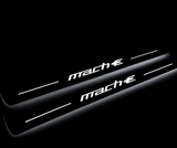 Mustang Mach-E 2020 illuminated entry guards in stainless steel with Mustang logo