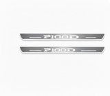 Tesla Model S 2012+ entry guards in stainless steel with P100D logo