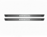 Two long silver-finished door sill plates with AMG C43 lettering on a light background, straight-on view.