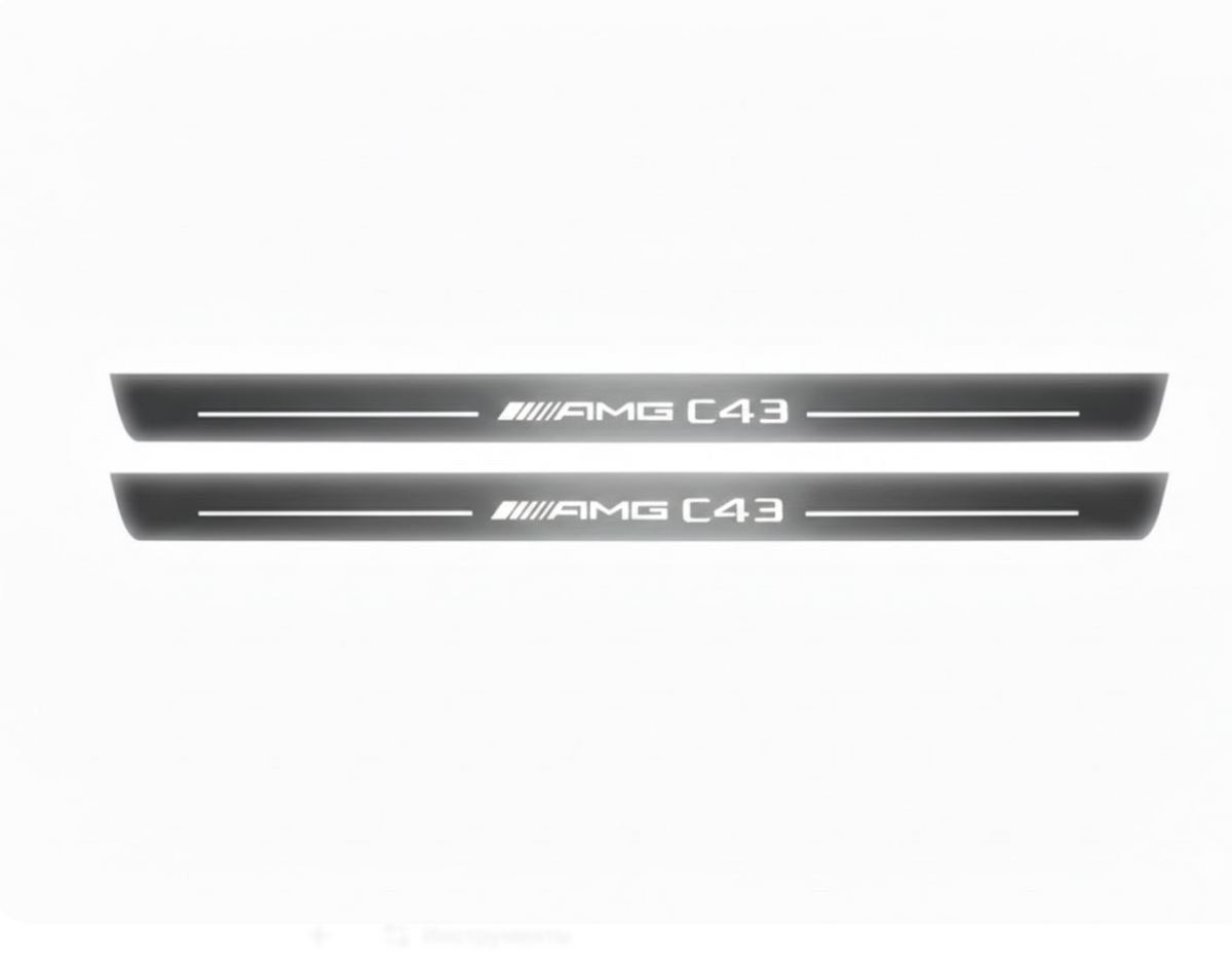 Two long silver-finished door sill plates with AMG C43 lettering on a light background, straight-on view.
