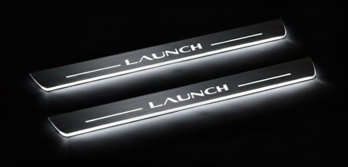 Tesla Model Y Juniper 2025-2026 stainless steel LED door sill plates with Launch logo