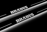 Mercedes G-Class W465 2024+ illuminated entry guards in stainless steel with Brabus logo