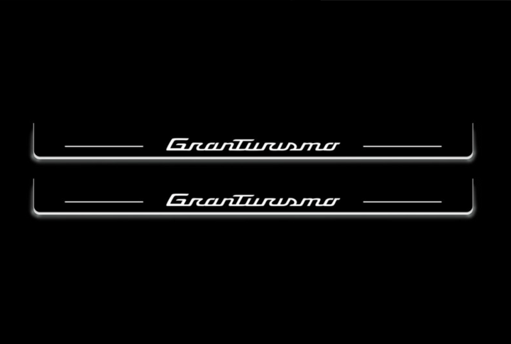 Maserati GranTurismo I 2007+ entry guards in stainless steel with GranTurismo logo