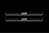 Two long door sill plates with 206 lettering and edges illuminated in white, straight-on view on a dark background.