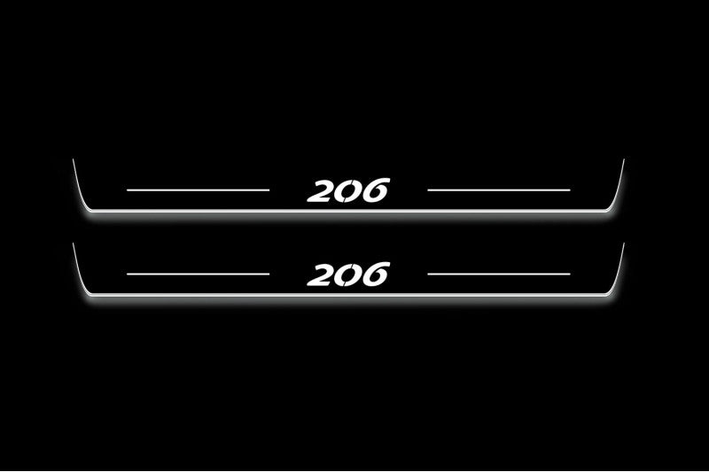 Two long door sill plates with 206 lettering and edges illuminated in white, straight-on view on a dark background.