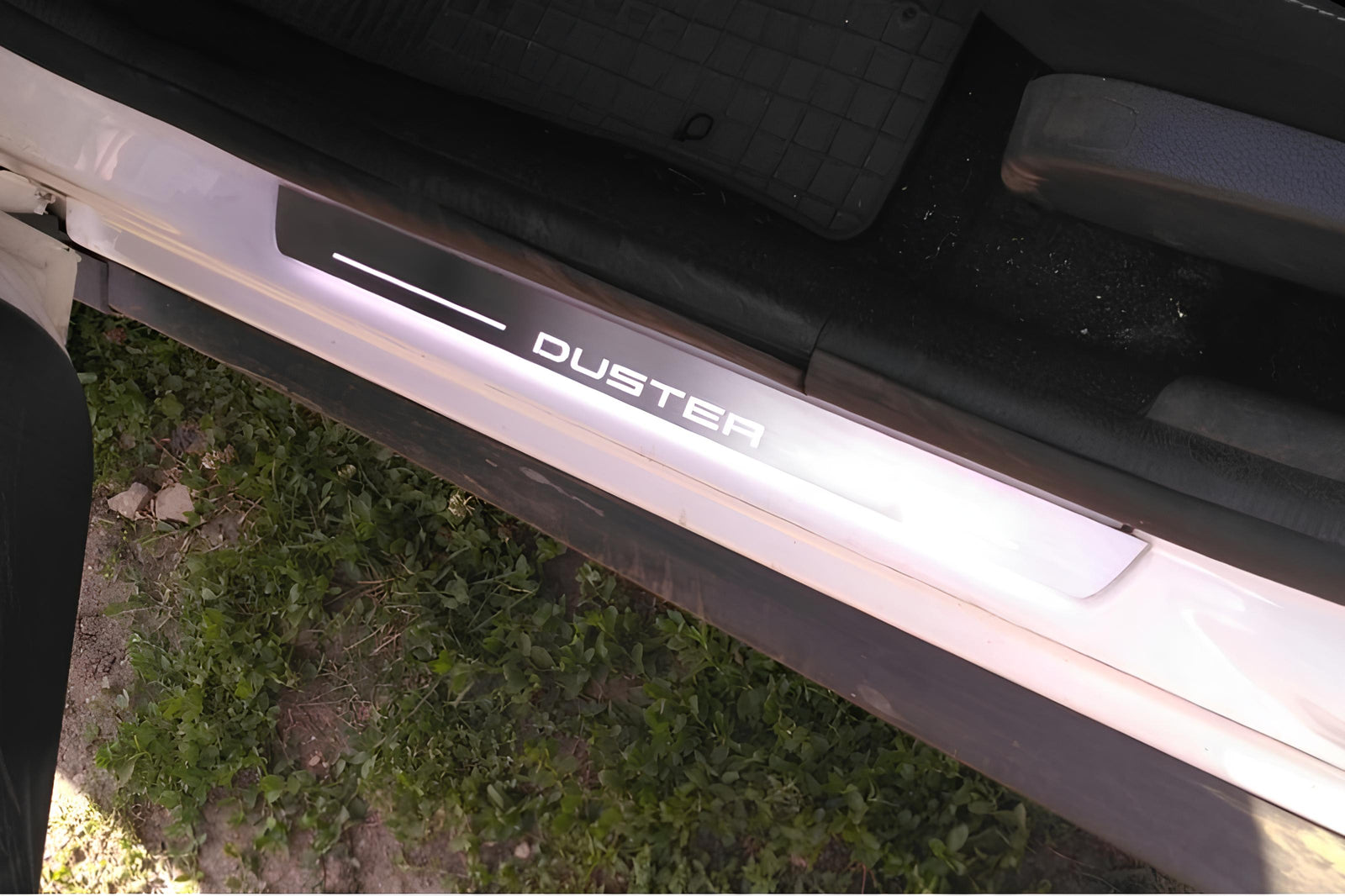 Dacia Duster I 2010+ LED door sill plates stainless steel with Duster logo