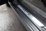 Citroen C-Elysee 2012+ illuminated entry guards in stainless steel with C-Elysee logo