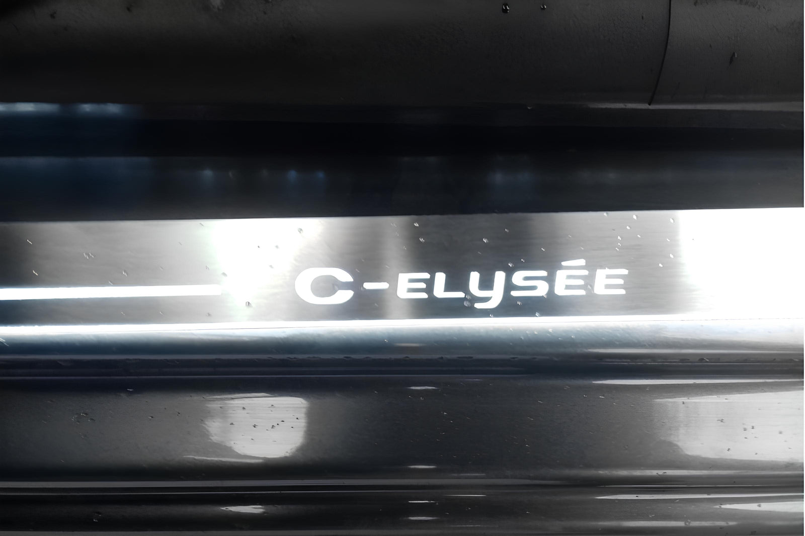 Citroen C-Elysee 2012+ LED door sill plates in stainless steel with C-Elysee logo