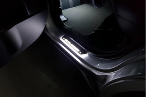 Illuminated LED Door Sill Tread Plates Mitsubishi Outlander II 2007-2012 With Outlander Logo Mitsubishi Led Door Sills opdesign