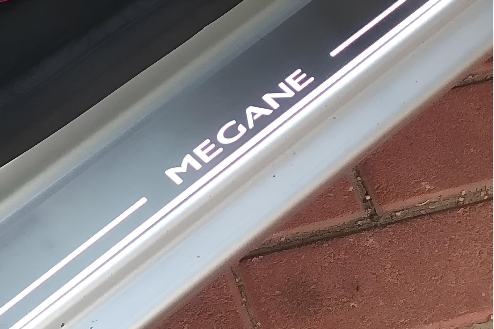 Renault Megane III 2009+ stainless steel illuminated entry guards with Megane logo