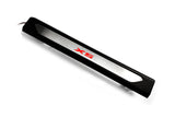 Black molded threshold trim with a silver insert bearing red X5 lettering and an attached wire, angled view on a white background.