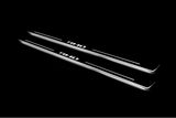 RAM 2500 V 2019+ illuminated entry guards in stainless steel with Illuminated RHO logo