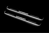 Two long door sill plates with Impreza lettering and edges illuminated in white, angled view on a dark background.