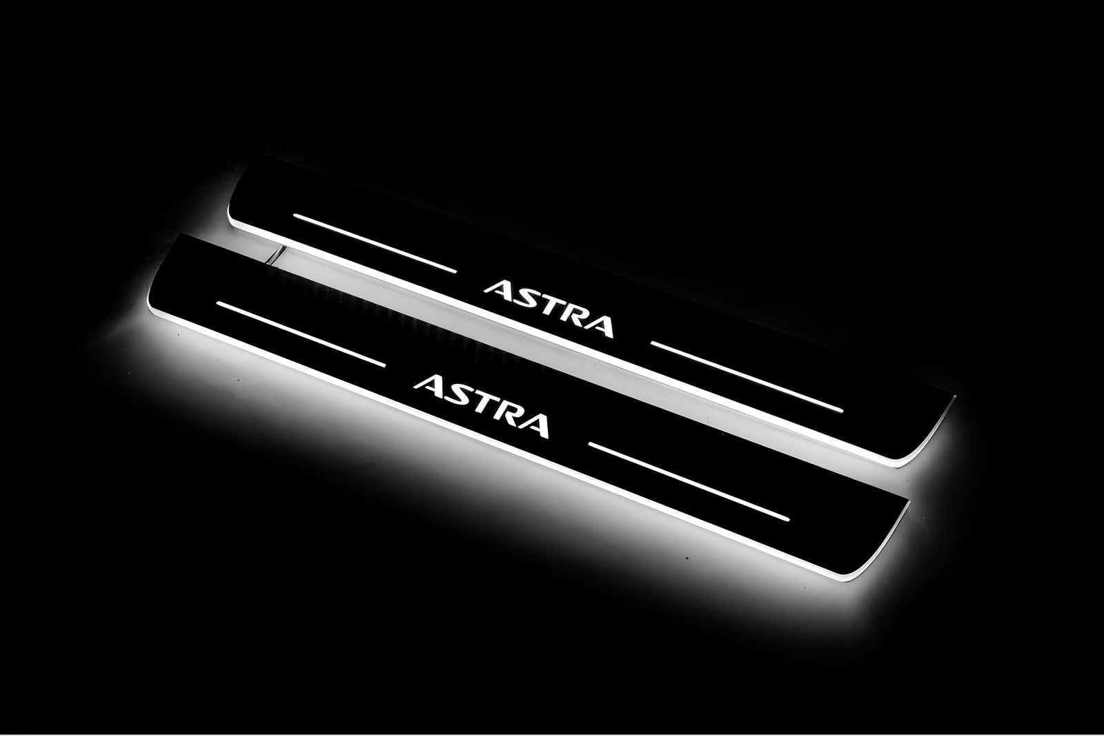 Vauxhall Astra VI 2009+ illuminated entry guards in stainless steel with Astra logo