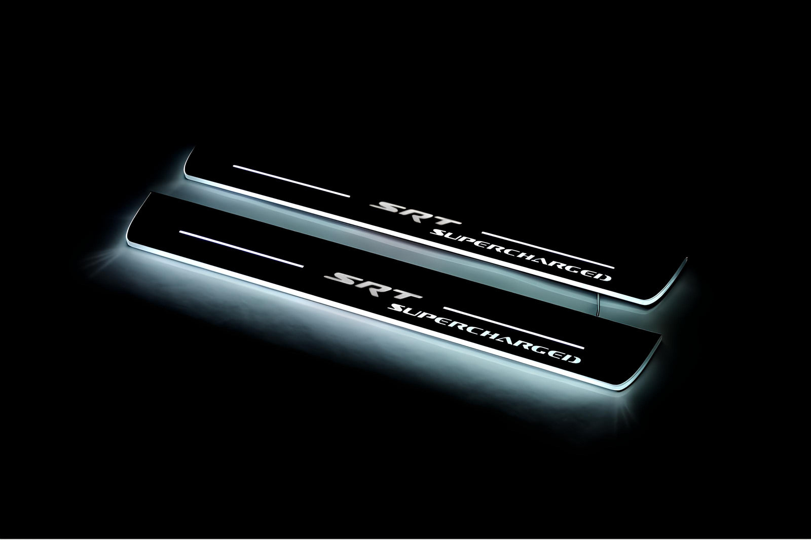 Jeep Grand Cherokee IV WK2 2010+ illuminated entry guards in stainless steel with SRT Supercharged logo