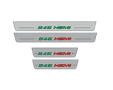 Catalog illustration of four gray door sill plates with green 345 and red HEMI lettering in one row with horizontal lines on a white background.